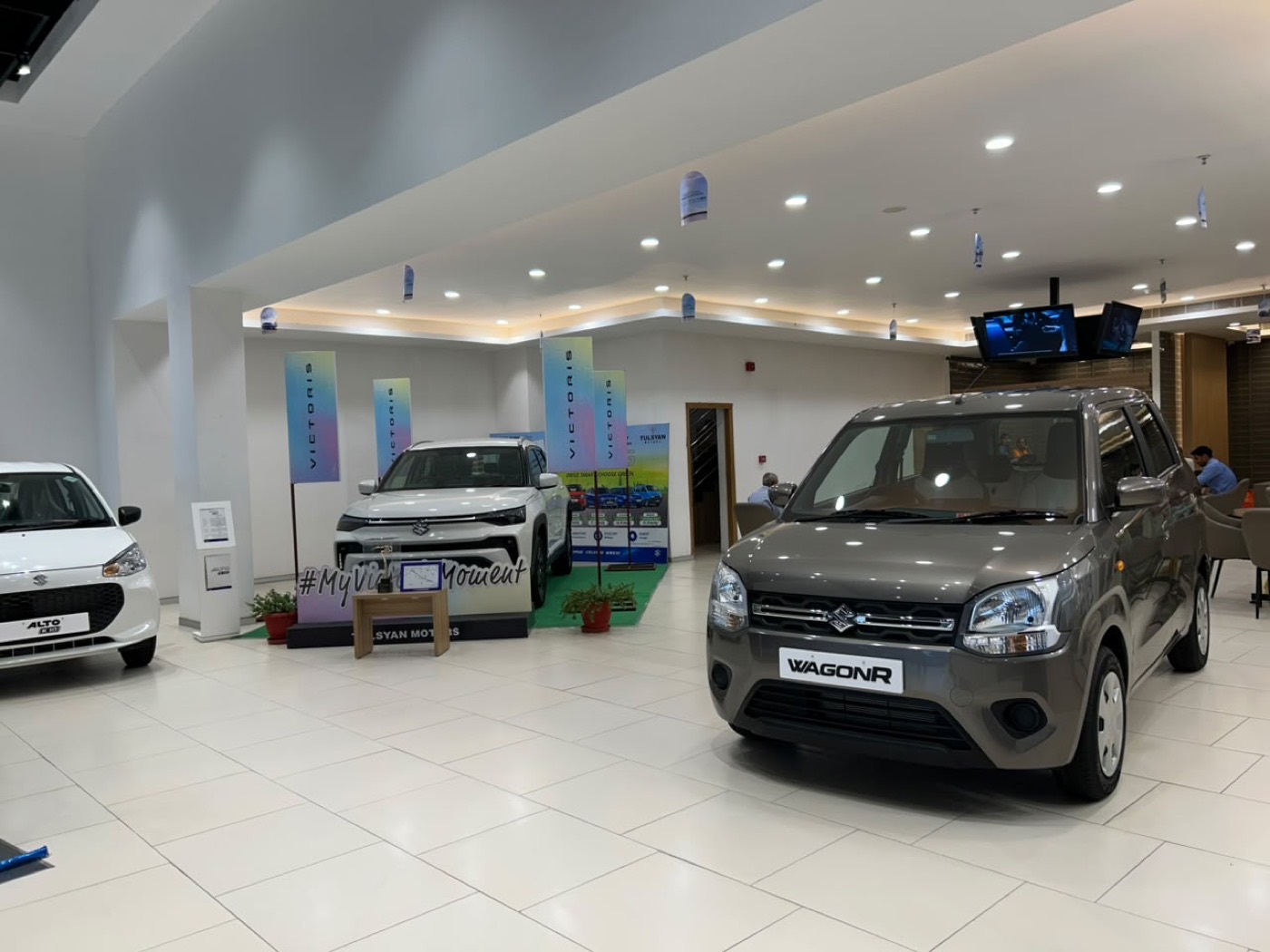 Maruti Suzuki cars on the showroom floor at Tulsyan Motors, Pandra, Ranchi