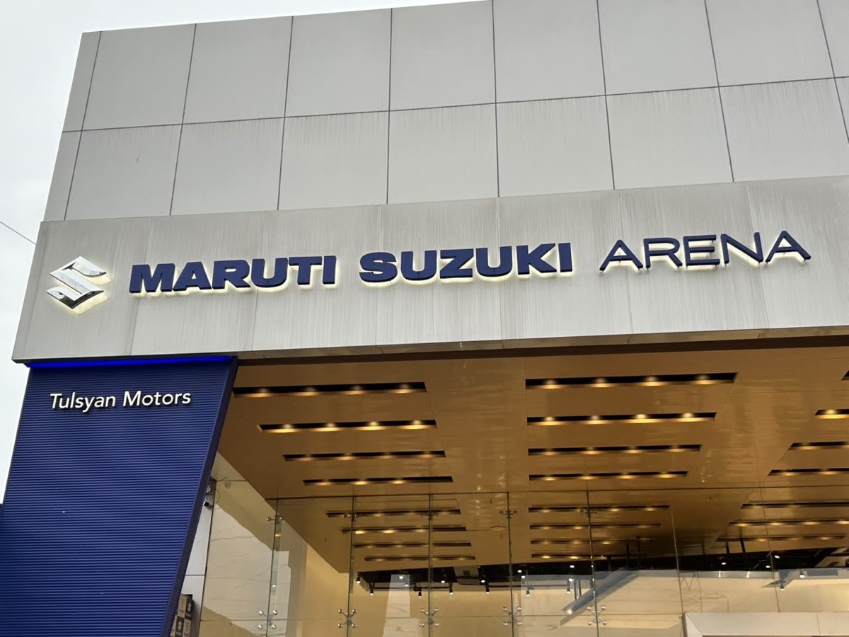 Maruti Suzuki ARENA and Tulsyan Motors signage at the Pandra showroom